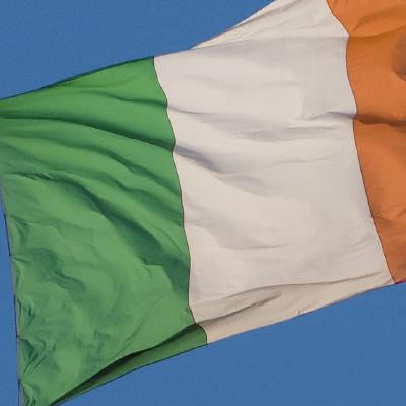 Irish flag against blue background