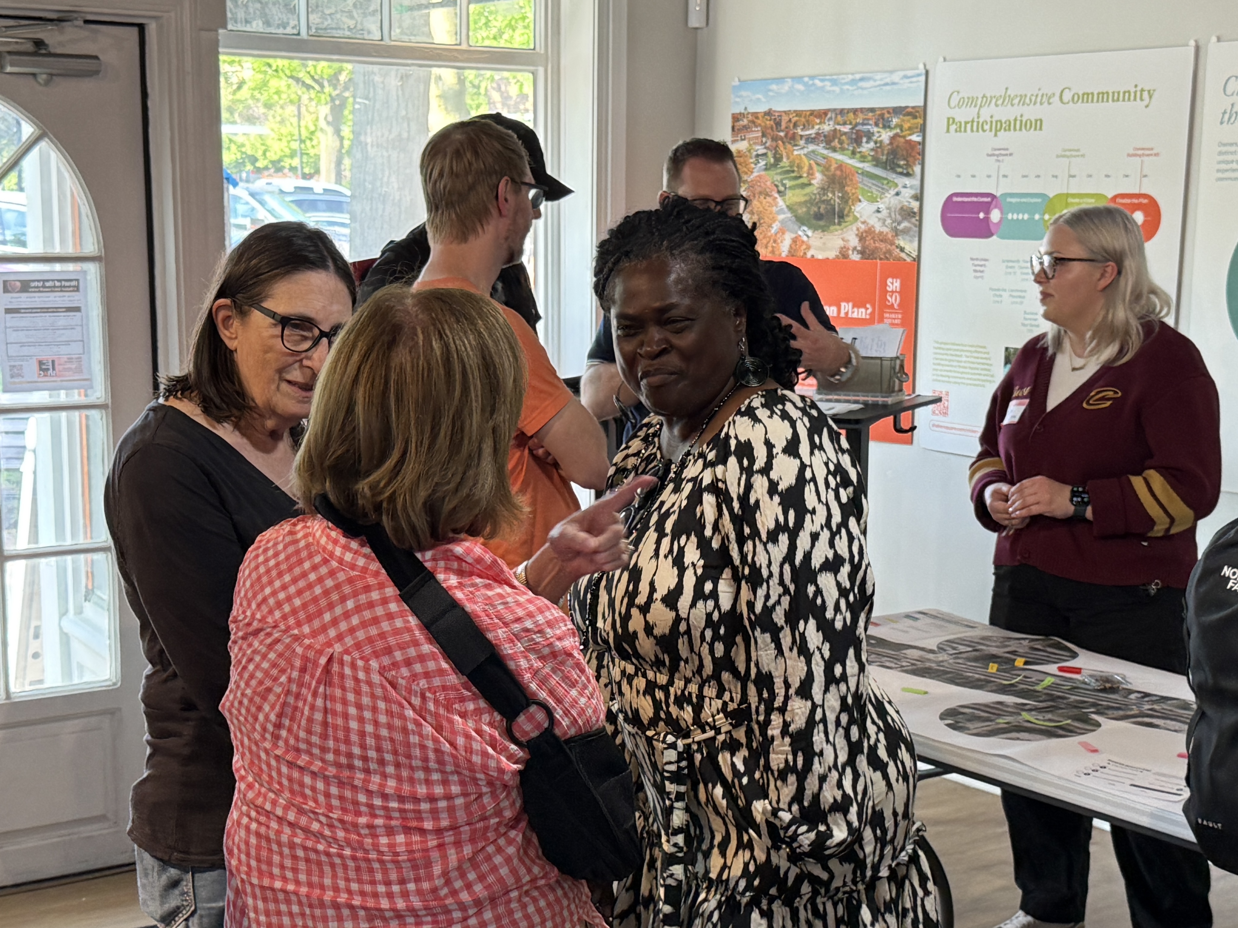 Constituents talk with the Councilwoman at the open house.