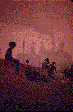 E. 72 St. Pier on Lake Erie. Municipal Light Plant in a Haze of Smoke, 1973