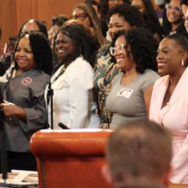 mayor next to a group of women