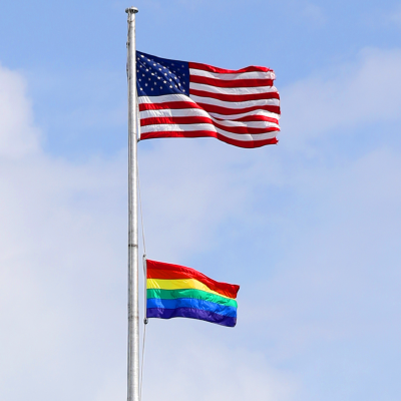 american flag and lgbtq flag