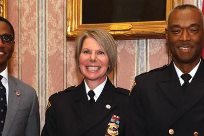 bibb, dorthy todd and police chief stand for picture