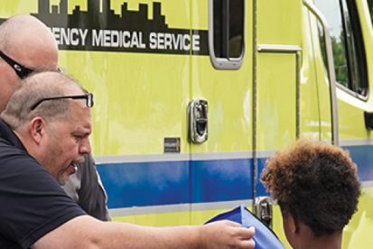first responders interact with neighborhood children