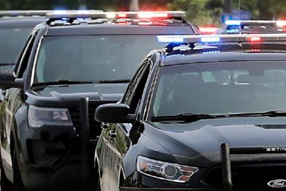 police cars on road