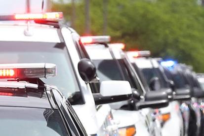 lineup of police cars on the street