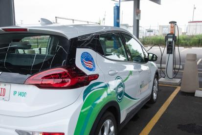 City Electric Vehicle at Charging Station