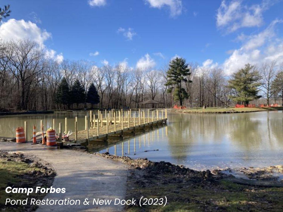 Camp Forbes pond restoration showing construction of a new boardwalk and dock on the pond.