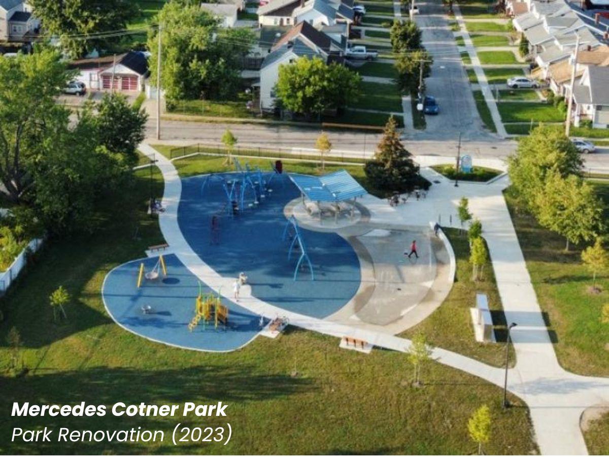 Aerial view of Mercedes Cotner Park with a new blue playground and a winding path with new trees along it.