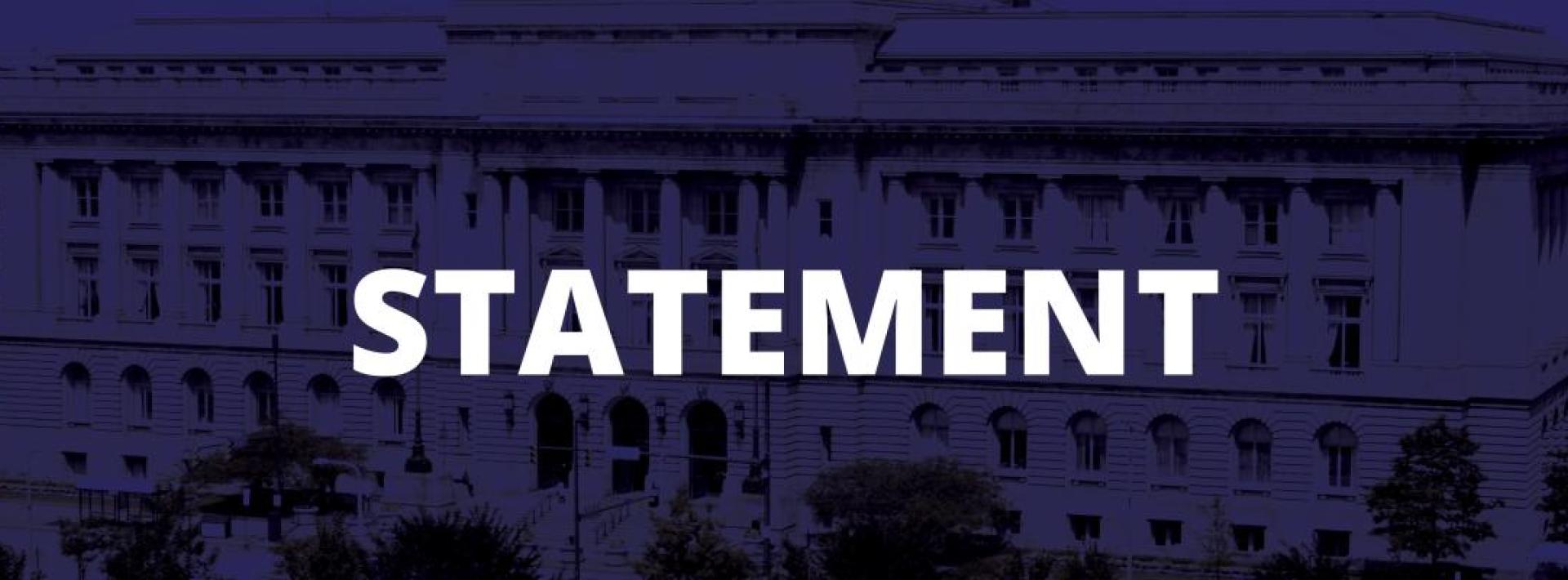 city hall dark blue background white text stating statement