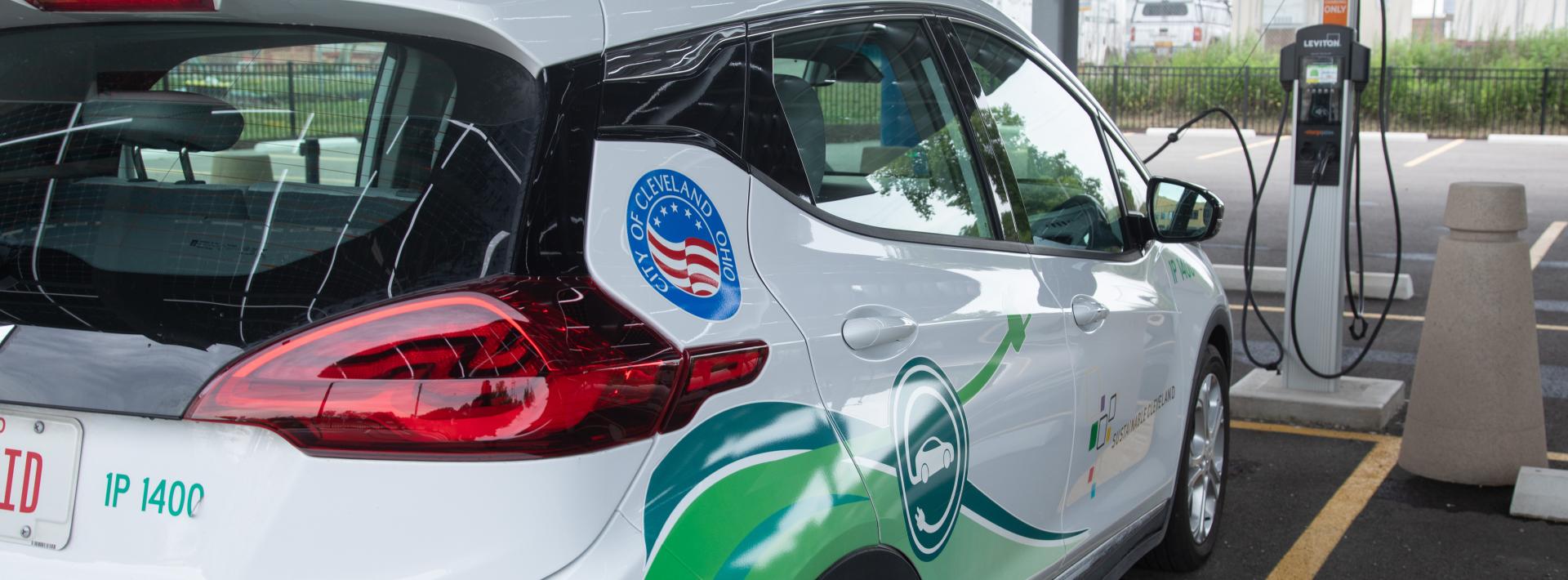City Electric Vehicle at Charging Station