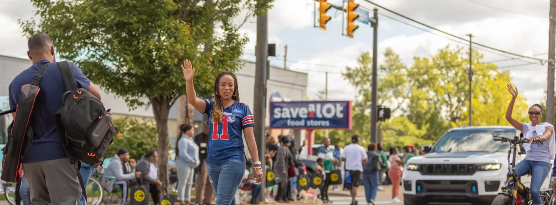 Woman Waving at Labor Day Parade