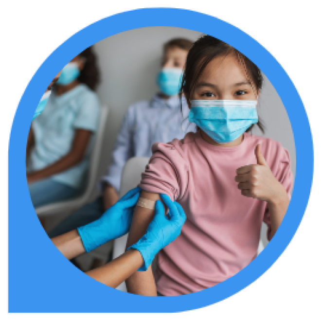 child giving thumbs-up while bandage applied to arm