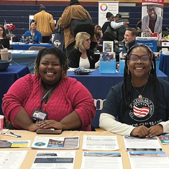 two Community Development employees tabling at an event