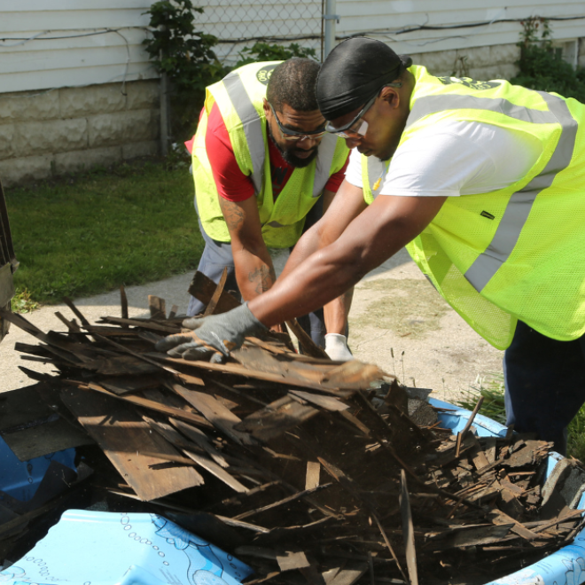 City volunters/workers removing debris